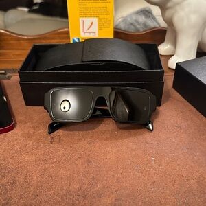 Prada OPR OPR A05S Stylish Black Sunglasses